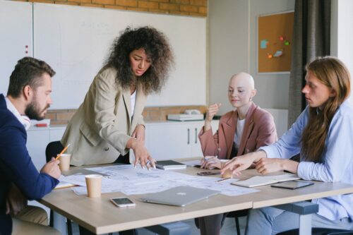 concentrated coworkers having a meeting around a table