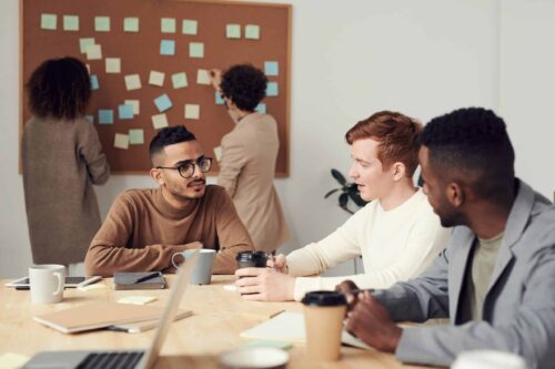 group of office employees having a meeting in the office